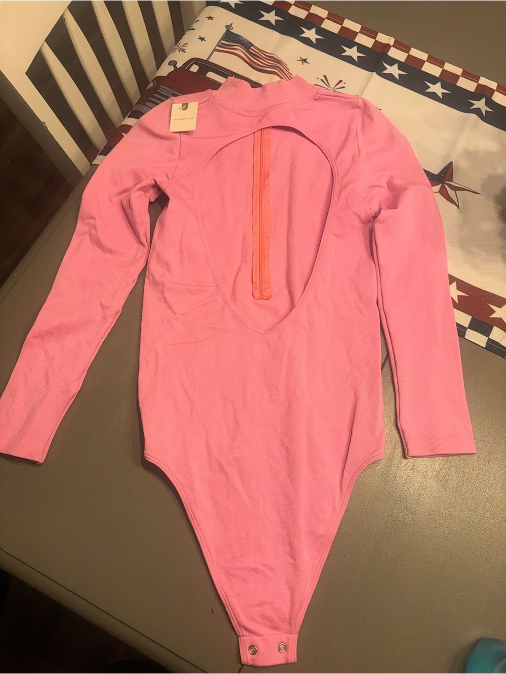 Anthropologie Pink Long-Sleeve Cutout Bodysuit with Orange Zip Detail